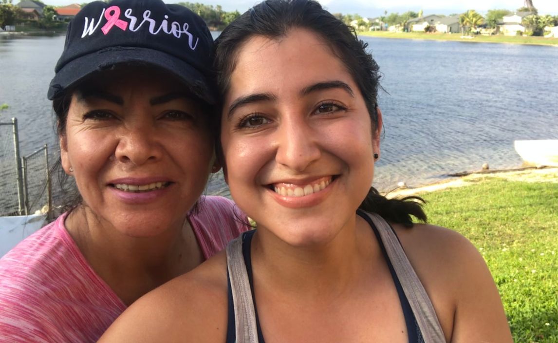 Melissa and her mom take a selfie together, both are smiling at the camera