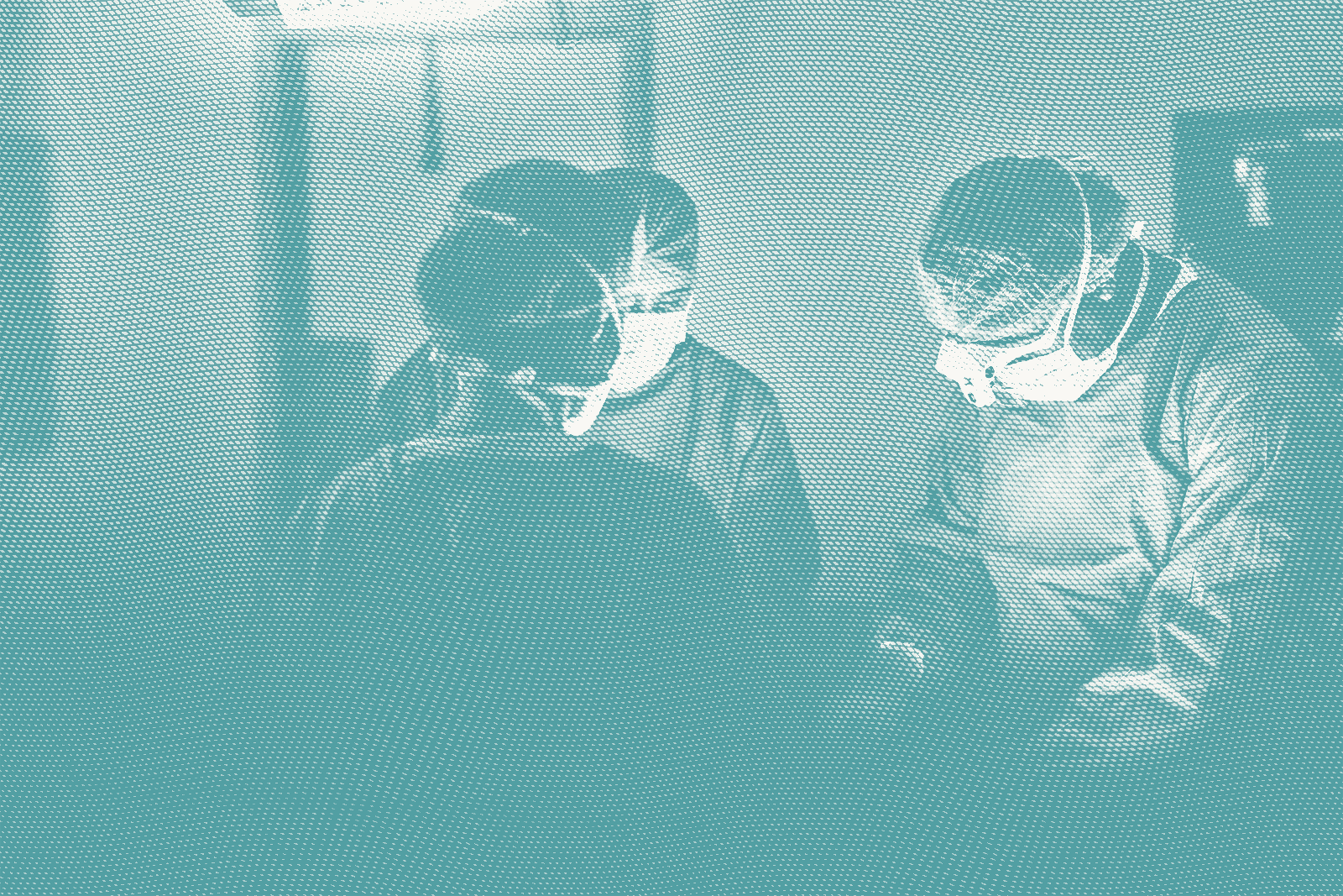 Several surgeons around a patient; illustrative of breast cancer surgery